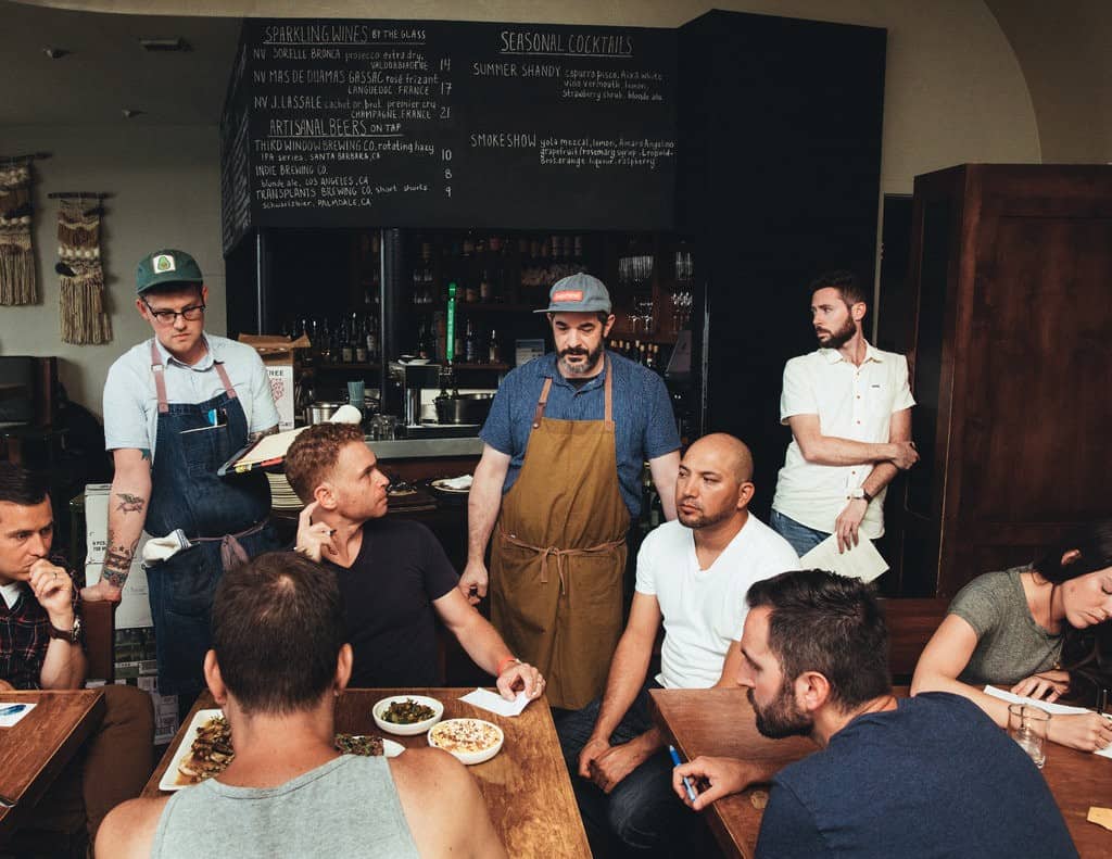 Rustic Canyon team having a pre-shift meeting