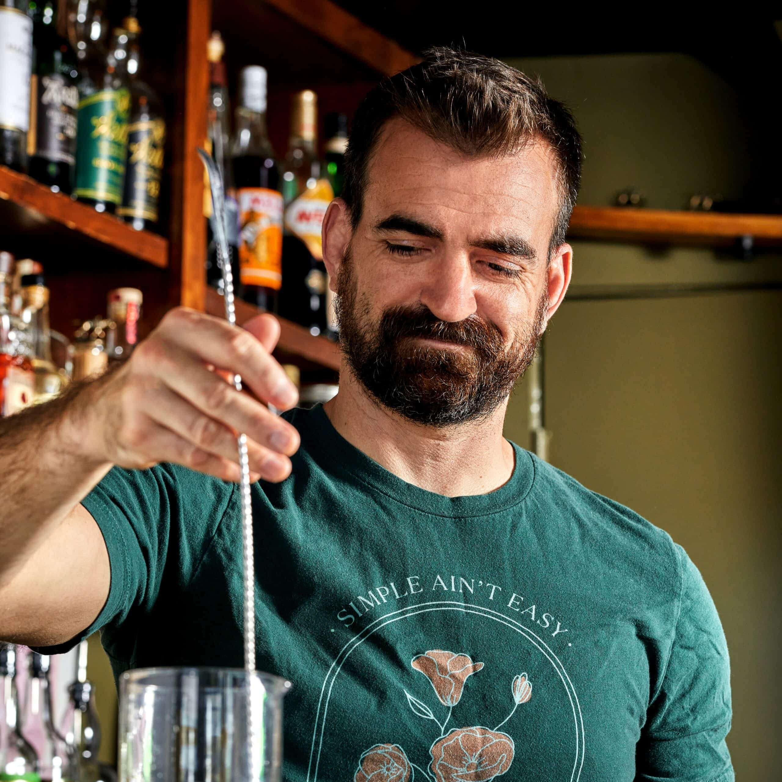 Justin stirring up a cocktail